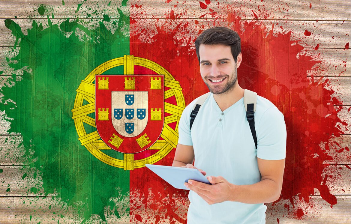 Student using tablet pc against portugal flag in grunge effect
